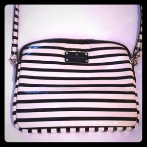 Black and white striped KATE SPADE crossbody bag